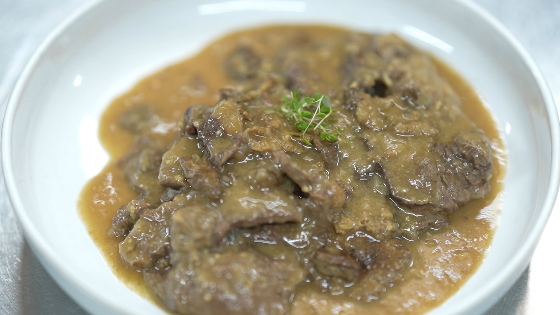 Plato de fricandón del restaurante Can Ugal en Les Corts