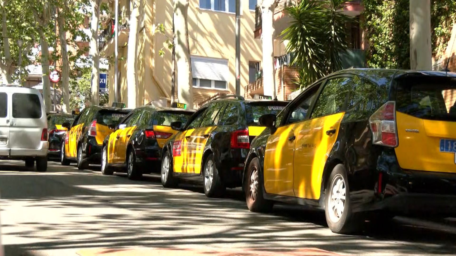 Line of taxis waiting for passengers near Park Güell in Barcelona